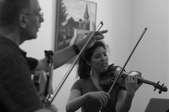 Mark Kaplan teaching a Heifetz student on the violin